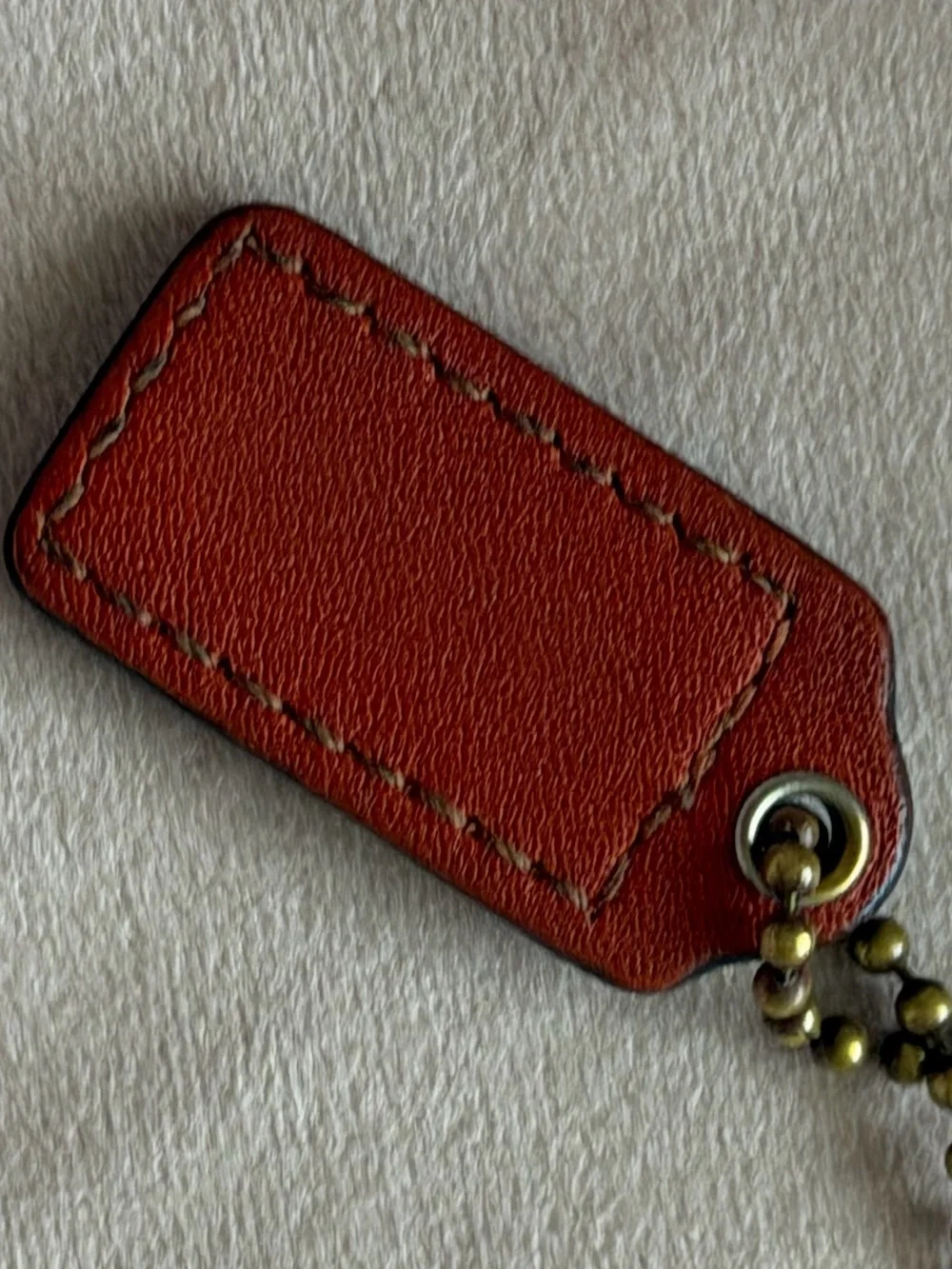 COACH Small Orange Leather Hangtag🧡